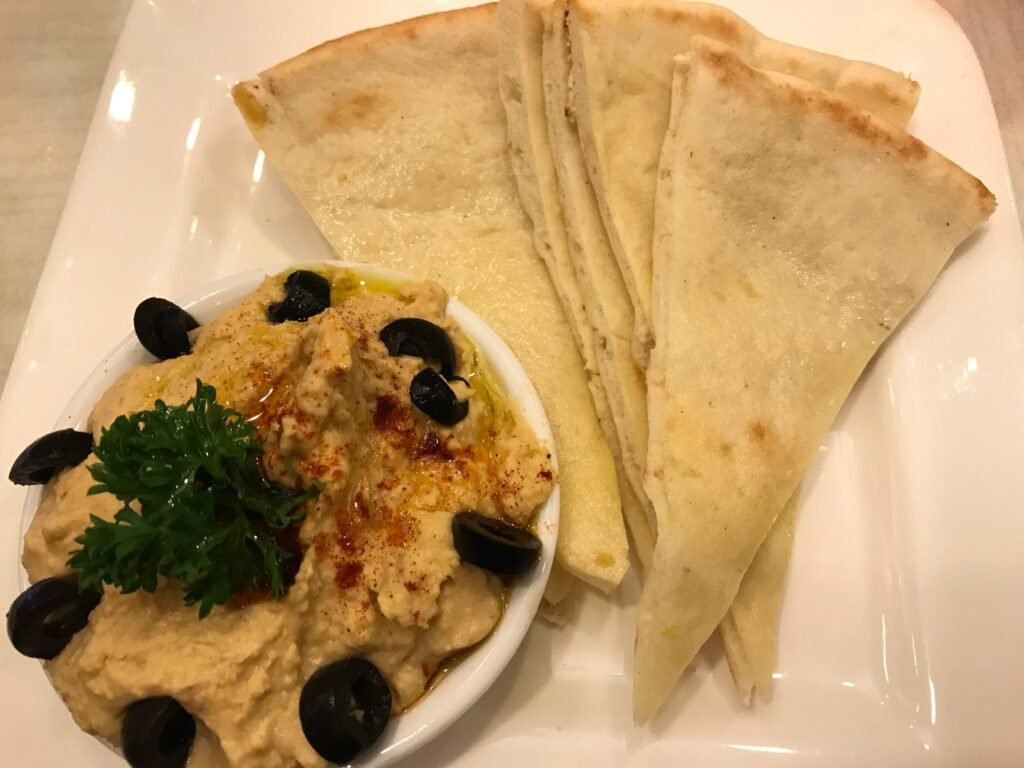 falafel wraps, hummus platters, and freshly baked pita bread, ahangama, sri lanka: localhi